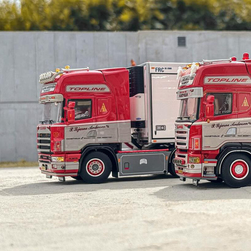 Tekno model trucks in front of a realistic concrete wall from Modeltex